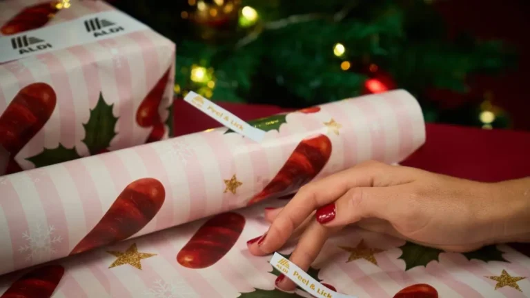 Lickable pigs-in-blankets wrapping paper from Aldi with peel-and-lick stickers.