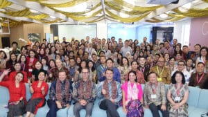 Staff and guests pose together inside dsm-firmenich’s Jakarta office.