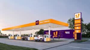 U-GO self-service fuel station with orange canopy.