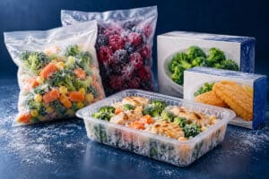 Frozen vegetables, berries and meals in pouches, cartons and a tray