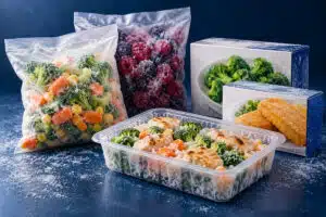 Frozen vegetables, berries and meals in pouches, cartons and a tray