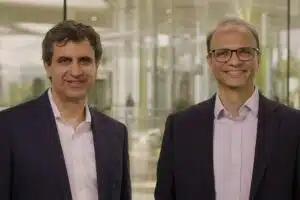 Fernando Fernandez and Srinivas Phatak standing together in dark jackets and light shirts